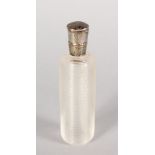 A CUT CRYSTAL FRENCH SCENT BOTTLE with silver top. 3.5ins long.