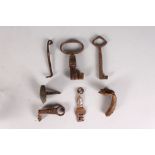 AN EARLY 17TH CENTURY IRON KEY, 3.25ins, and SIX EARLY PIECES (7).