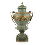 A French gilt-bronze mounted marble urn