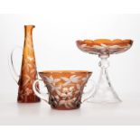 A group of Baccarat amber art glass