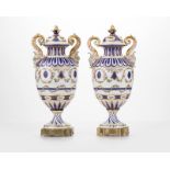 Pair of Sevres-style Paris porcelain lidded urns