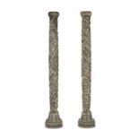 A pair of Continental carved wood columns
