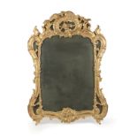 A Continental carved giltwood wall mirror