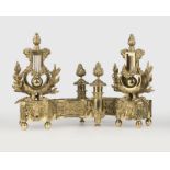 A pair of Louis XVI-style fireplace chenets