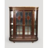 A gilt bronze-mounted Louis XVI-style vitrine cabinet