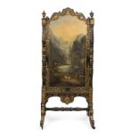 A Victorian papier-mache and lacquered fire screen