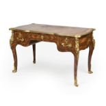 A Louis XV-style gilt bronze-mounted bureau plat