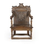 A Jacobean carved oak armchair