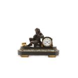 A French gilt and patinated bronze mantel clock