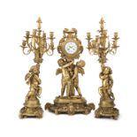 A Louis XVI-style gilt-bronze mantel clock & garniture