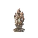 A Chinese carved soapstone sculpture, Buddha with attendants