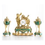 An Empire-style malachite mantel clock and garniture