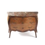 A Louis XV-style parquetry commode