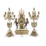 A gilt-bronze mantel clock and garniture