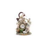 A Meissen porcelain figural mantel clock