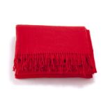 A red Pratesi cashmere throw blanket with fringe