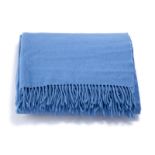 A blue Pratesi cashmere throw blanket with fringe