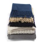 A group of cashmere blankets, including Pratesi