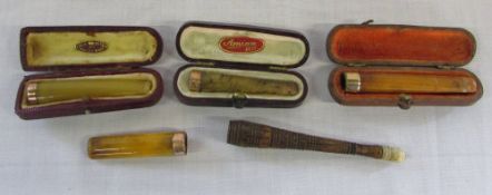 Various cheroot/cigarette holders inc 3 with 9ct mounts