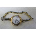 9ct gold ladies wrist watch (no winder) with elasticated yellow metal strap