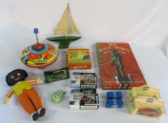 Various vintage/retro toys inc golly doll, spinning top, board games,