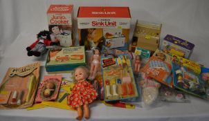 Various dolls and play accessories including Casdon Junior Cooker and Sink Unit etc