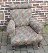 Upholstered chair on turned legs