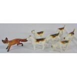 Beswick fox with 6 hounds (fox has tail re-glued)