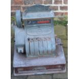 National cash register in brass & wood serial number 1202170 652 with top plate 'A O Powell' &