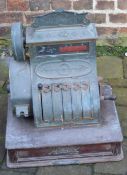 National cash register in brass & wood serial number 1202170 652 with top plate 'A O Powell' &