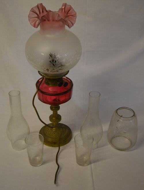 Brass paraffin lamp (converted for electricity) and various glassware