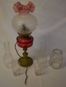 Brass paraffin lamp (converted for electricity) and various glassware