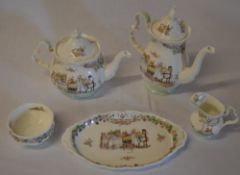 Royal Doulton Brambly Hedge tea service comprising of tea pot, coffee pot, sugar bowl,