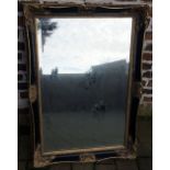 Large ornate black & gilt framed wall mirror 116cm by 75cm