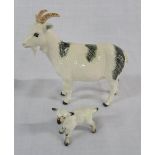 Beswick black and white goat and a kid