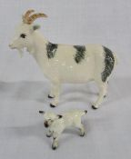 Beswick black and white goat and a kid