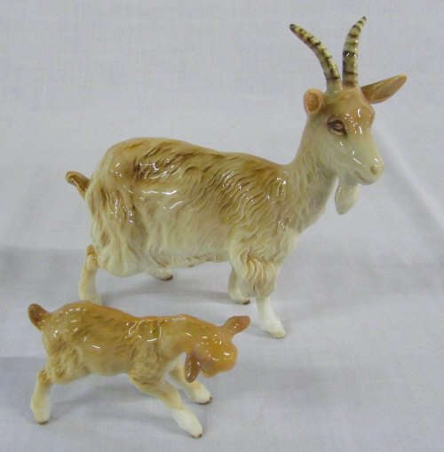Beswick goat (repair to horn) and kid