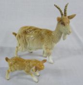 Beswick goat (repair to horn) and kid