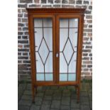 Late Victorian/Edwardian mahogany display cabinet with box wood stringing on tapering legs with