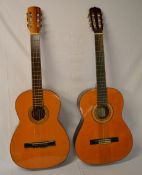 2 acoustic guitars