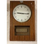 Electric GPO wall clock in a mahogany case