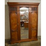 Victorian triple wardrobe with burr walnut panels & a mirror door.