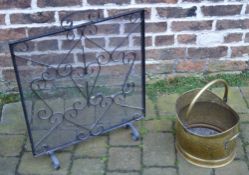 Mesh fire screen and a brass coal bucket