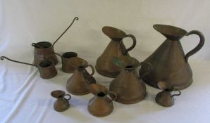 Assorted copper jugs