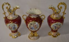 Ceramic matching vase and two jugs decorated with classical scenes and gilding (af)