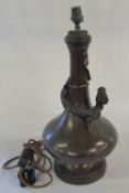 Bronze lamp base decorated with a climbing Chinese dragon H 43 cm
