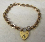 9ct gold bracelet and padlock weight 15.