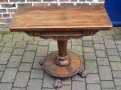 William IV fold over breakfast table in rosewood on a central pedestal with paw feet