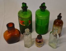 6 chemists bottles and a small ink bottle