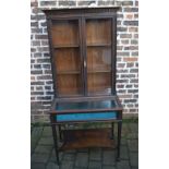 Small early 20th century mahogany display cabinet & case with carved blind fret work & spade feet